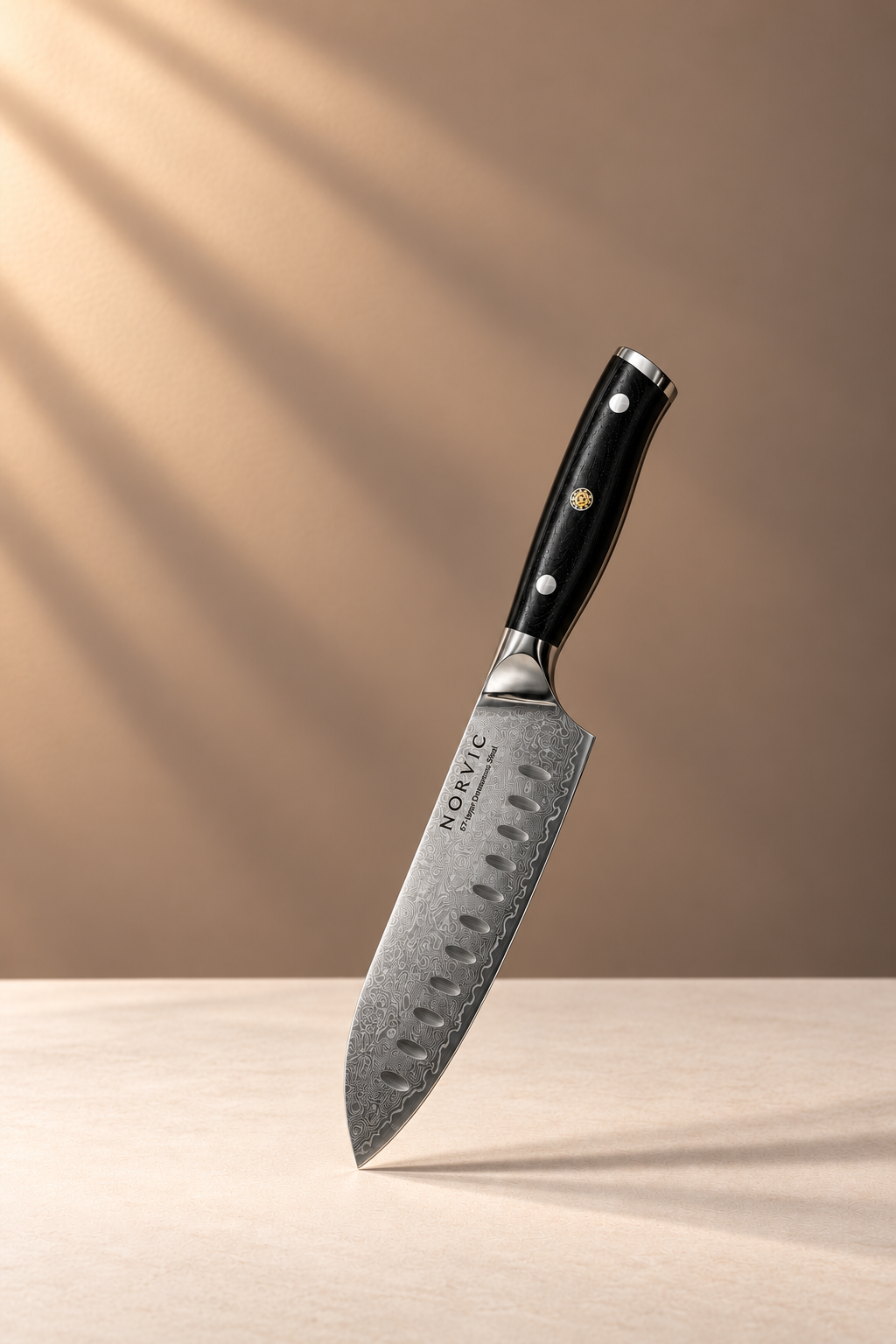 Norvic Worstead 5-inch Santoku knife with patterned Damascus blade and black G10 handle