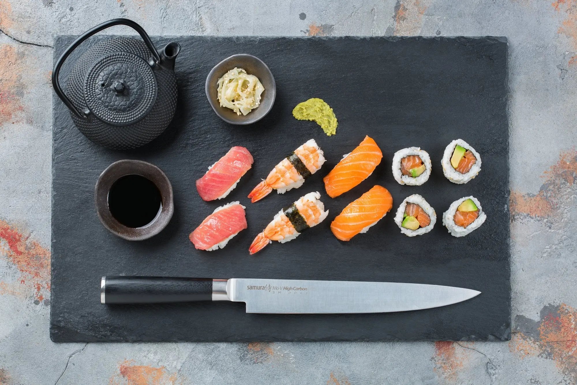 Precision Knives Samura MO-V Slicing Knife on slate with sushi