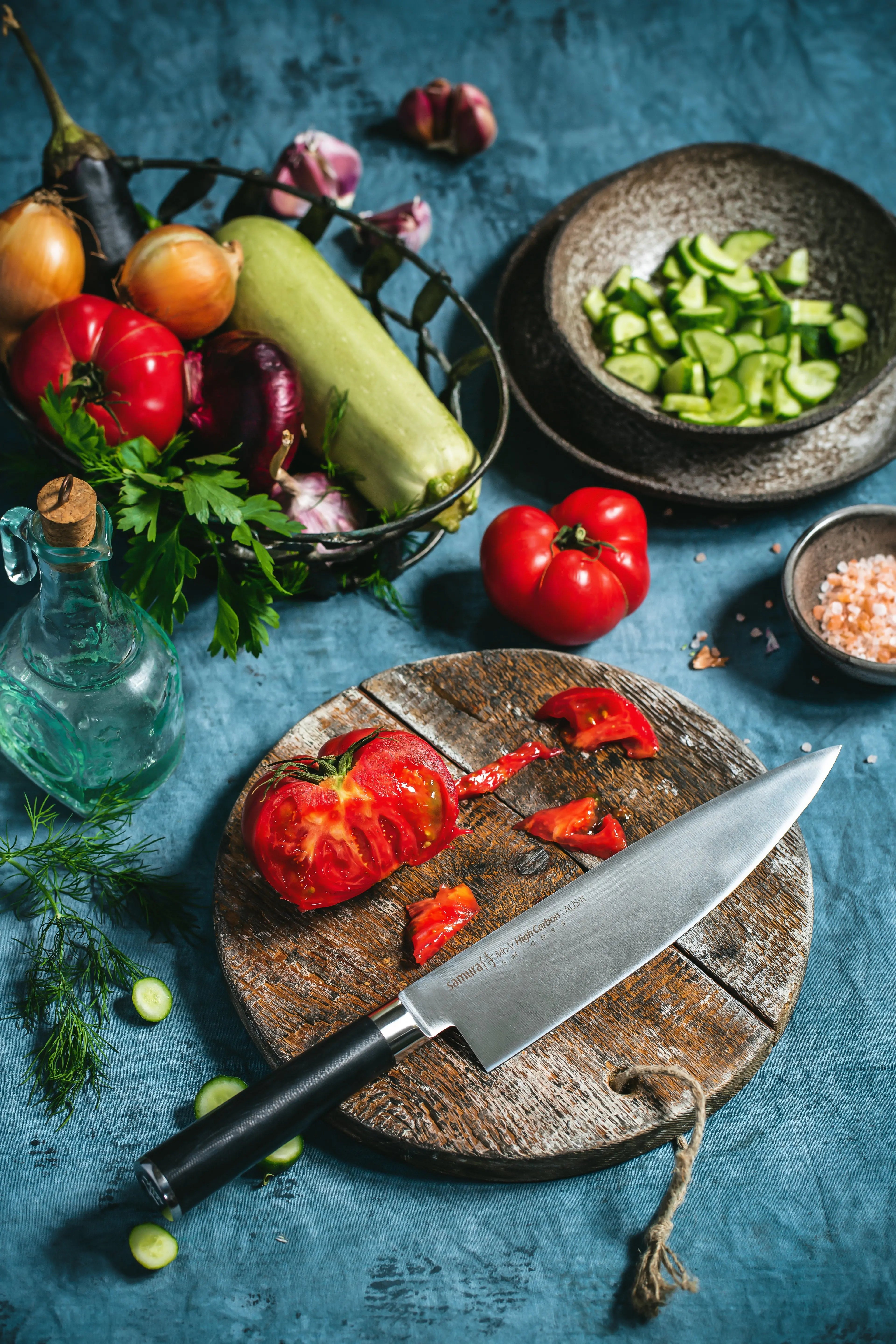 Precision Knives Samura MO-V Chefs Knife on chopping board
