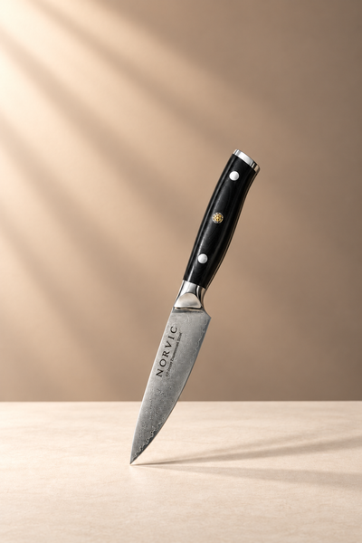 Norvic Worstead 3.5-inch paring knife with patterned Damascus blade and black G10 handle